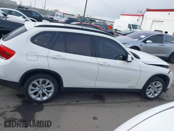 2014 BMW X1 xDrive28i z VIN WBAVL1C54EVY23533, wystawiony jako IAAI lot #41949759 z przebiegiem Nie podano mil oraz . Historia ofert i sprzedaży dostępna na DreamBid. Obrazek 13.