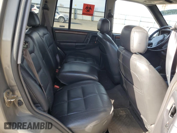 1997 Jeep Grand Cherokee Limited with VIN 1J4GZ78Y4VC754624, listed as a Copart auction lot 49884435 with 144,682 mi miles and Salvage Title. Bid and sale history available at carsss.com. Image 11.