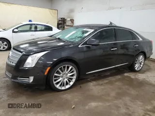 2013 Cadillac XTS Premium z VIN 2G61S5S37D9158806, wystawiony jako Copart lot #48414765 z przebiegiem 165 960 mil mil oraz Szkody całkowita. Historia ofert i sprzedaży dostępna na DreamBid. Obrazek 1.