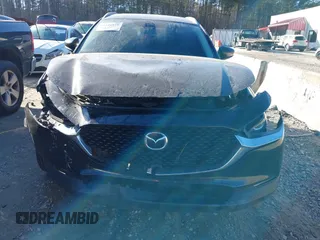 2023 Mazda CX-30 2.5 S Preferred Package with VIN 3MVDMBCM9PM519070, listed as a IAAI auction lot 41351129 with 76,711 mi miles. Bid and sale history available at carsss.com. Image 12.