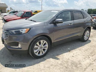 2022 Ford Edge Titanium with VIN 2FMPK4K91NBA54985, listed as a Copart auction lot 61680325 with 58,939 mi miles and Salvage title. Bid and sale history available at DreamBid. Image 1.