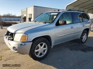 2007 GMC Envoy SLE with VIN 1GKDS13S872156921, listed as a Copart auction lot 41433705 with NaN miles and Salvage Title. Bid and sale history available at carsss.com. Image 1.