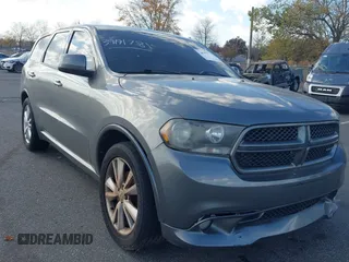 2011 Dodge Durango Heat with VIN 1D4RE3GG8BC733088, listed as a IAAI auction lot 40764161 with 149,846 mi miles. Bid and sale history available at carsss.com. Image 1.