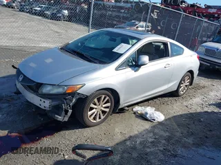 2012 Honda Civic Cpe EX-L with VIN 2HGFG3B17CH509114, listed as a IAAI auction lot 41456297 with 79,039 mi miles. Bid and sale history available at carsss.com. Image 17.