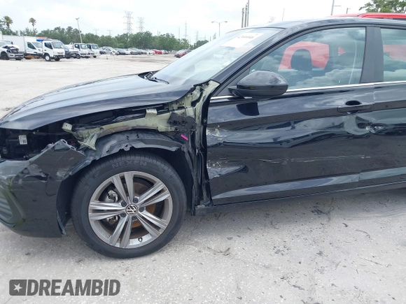 2023 Volkswagen Jetta SE with VIN 3VW7M7BU3PM037141, listed as a IAAI auction lot 42446046 with 21,149 mi miles and . Bid and sale history available at DreamBid. Image 6.