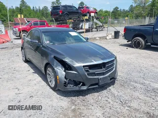 2014 Cadillac CTS Luxury RWD z VIN 1G6AR5SX1E0122314, wystawiony jako IAAI lot #42151408 z przebiegiem 146 812 mil mil oraz . Historia ofert i sprzedaży dostępna na DreamBid. Obrazek 1.