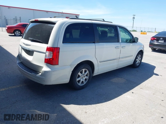 2013 Chrysler Town & Country Touring with VIN 2C4RC1BG0DR585138, listed as a IAAI auction lot 42186087 with 205,152 mi miles and . Bid and sale history available at DreamBid. Image 4.