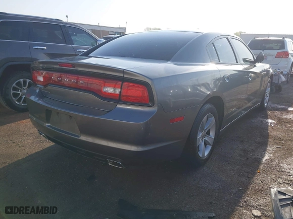 2012 Dodge Charger SE with VIN 2C3CDXBG2CH297166, listed as a IAAI auction lot 41992613 with 136,755 mi miles. Bid and sale history available at carsss.com. Image 4.