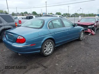 2000 Jaguar S-Type V8 z VIN SAJDA01D0YGL07334, wystawiony jako IAAI lot #42365276 z przebiegiem 63 379 mil mil oraz . Historia ofert i sprzedaży dostępna na DreamBid. Obrazek 4.