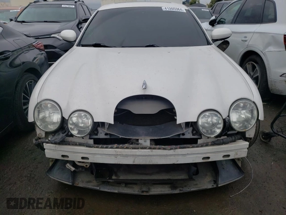 2003 Jaguar S-Type with VIN SAJEA01T43FM87170, listed as a Copart auction lot 41265364 with 79,273 mi miles and Non Repairable. Bid and sale history available at DreamBid. Image 5.