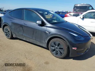 2024 Tesla Model Y with VIN 7SAYGDED8RF213796, listed as a IAAI auction lot 41634130 with 7,710 mi miles and . Bid and sale history available at DreamBid. Image 1.