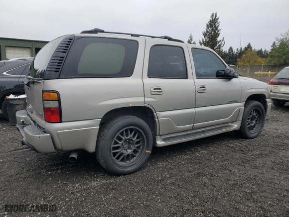 2005 GMC Yukon Denali with VIN 1GKEK63U95J105126, listed as a Copart auction lot 76590224 with 203,913 mi miles and Salvage Title. Bid and sale history available at carsss.com. Image 3.