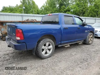 2015 Ram 1500 Tradesman z VIN 3C6RR7KT7FG700218, wystawiony jako Copart lot #58926235 z przebiegiem 131 668 mil mil oraz Szkoda całkowita • Salvage title. Historia ofert i sprzedaży dostępna na DreamBid. Obrazek 3.