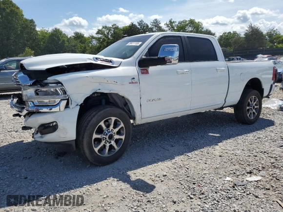 2023 Ram 2500 Laramie with VIN 3C6UR5FL2PG514919, listed as a Copart auction lot 59411155 with 23,679 mi miles and Salvage title. Bid and sale history available at DreamBid. Image 1.