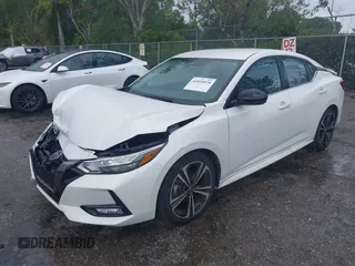2023 Nissan Sentra SR with VIN 3N1AB8DV5PY272002, listed as a IAAI auction lot 42010828 with 13,210 mi miles and . Bid and sale history available at DreamBid. Image 2.