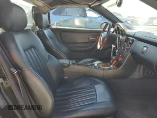 2004 Mercedes-Benz SLK-Class with VIN WDBKK65F24F306069, listed as a Copart auction lot 68791864 with 99,835 mi miles and Salvage Title. Bid and sale history available at carsss.com. Image 10.