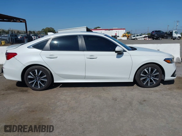 2024 Honda Civic EX z VIN 2HGFE1F74RH304237, wystawiony jako IAAI lot #42175076 z przebiegiem 24 618 mil mil oraz . Historia ofert i sprzedaży dostępna na DreamBid. Obrazek 14.