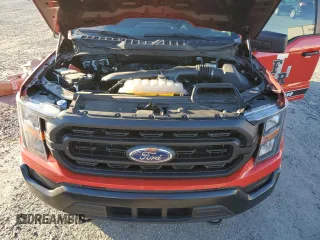 2023 Ford F-150 with VIN 1FTFW1P85PKD82406, listed as a Copart auction lot 84744944 with 32,982 mi miles and Salvage title. Bid and sale history available at DreamBid. Image 11.