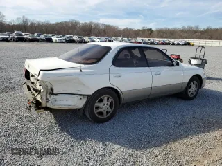 1995 Lexus ES 300 with VIN JT8GK13T8S0107061, listed as a Copart auction lot 49986875 with 306,343 mi miles and Salvage Title. Bid and sale history available at DreamBid. Image 3.