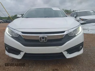 2017 Honda Civic EX-L with VIN 2HGFC1F72HH658763, listed as a IAAI auction lot 41972317 with 166,168 mi miles and . Bid and sale history available at DreamBid. Image 13.