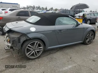 2017 Audi TT Roadster z VIN TRUT5CFV0H1022983, wystawiony jako Copart lot #53056424 z przebiegiem 38 478 mil mil oraz . Historia ofert i sprzedaży dostępna na DreamBid. Obrazek 3.