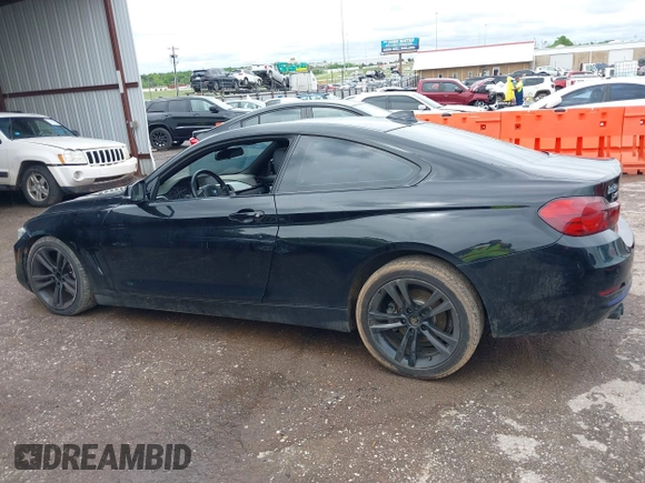 2015 BMW 4 Series 428i xDrive with VIN WBA3N5C56FK198340, listed as a IAAI auction lot 42153190 with 96,054 mi miles and . Bid and sale history available at DreamBid. Image 14.