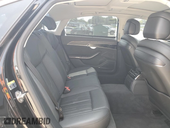 2019 Audi A8 with VIN WAU8DAF82KN020487, listed as a Copart auction lot 60214005 with 75,895 mi miles and Salvage title. Bid and sale history available at DreamBid. Image 10.