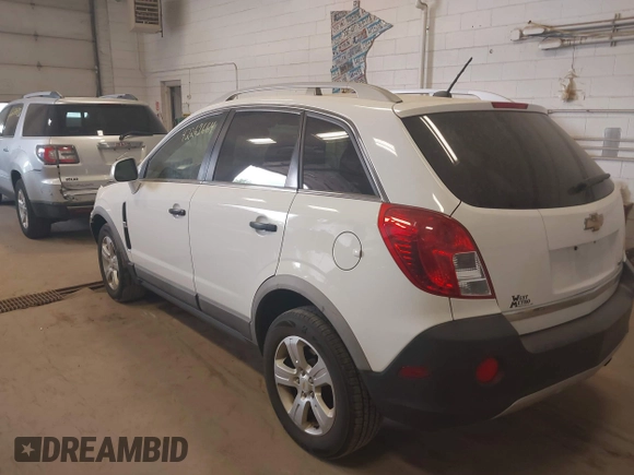 2014 Chevrolet Captiva Sport LS with VIN 3GNAL2EK9ES648395, listed as a IAAI auction lot 42261664 with 128,360 mi miles and . Bid and sale history available at DreamBid. Image 3.