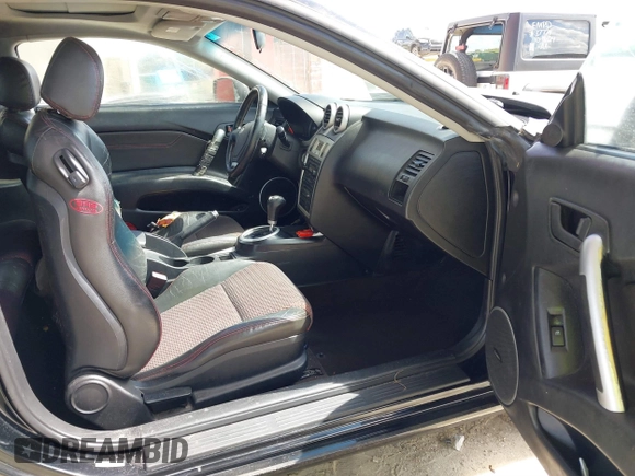 2006 Hyundai Tiburon GT z VIN KMHHN65F56U224768, wystawiony jako IAAI lot #40672721 z przebiegiem 158 535 mil mil oraz . Historia ofert i sprzedaży dostępna na DreamBid. Obrazek 5.