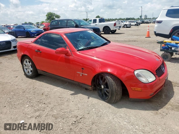 2000 Mercedes-Benz SLK 230 Kompressor with VIN WDBKK47F2YF156715, listed as a Copart auction lot 63873805 with 140,706 mi miles and Salvage title. Bid and sale history available at DreamBid. Image 4.