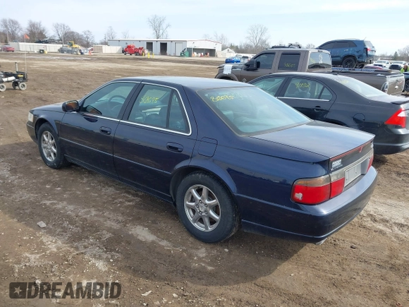 1999 Cadillac Seville Touring STS z VIN 1G6KY5493XU913994, wystawiony jako IAAI lot #41780695 z przebiegiem 60 375 mil mil oraz . Historia ofert i sprzedaży dostępna na DreamBid. Obrazek 3.
