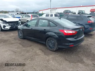 2012 Ford Focus SE with VIN 1FAHP3F27CL112277, listed as a IAAI auction lot 42053243 with 104,885 mi miles. Bid and sale history available at carsss.com. Image 3.