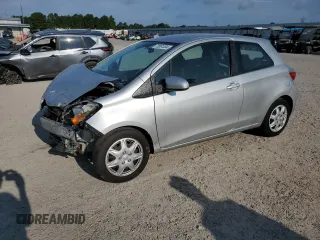 2014 Toyota Yaris L with VIN VNKJTUD30EA006137, listed as a Copart auction lot 72061304 with 104,664 mi miles and Salvage Title. Bid and sale history available at carsss.com. Image 1.