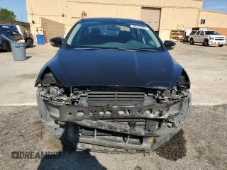 2016 Ford Focus SE z VIN 1FADP3F2XGL261707, wystawiony jako Copart lot #59078565 z przebiegiem 79 820 mil mil oraz Szkoda całkowita • Salvage title. Historia ofert i sprzedaży dostępna na DreamBid. Obrazek 5.