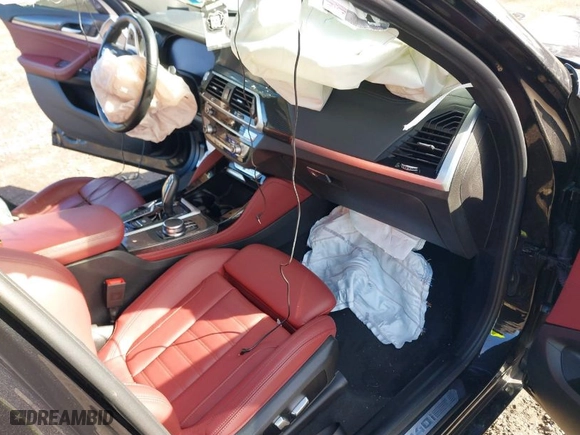 2021 BMW X4 M40i with VIN 5UX2V5C03M9H54824, listed as a IAAI auction lot 41817714 with 34,880 mi miles. Bid and sale history available at carsss.com. Image 5.
