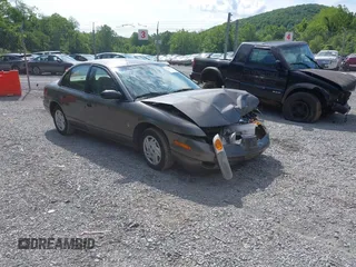 2001 Saturn SL with VIN 1G8ZF52851Z238231, listed as a IAAI auction lot 42454503 with 144,748 mi miles and . Bid and sale history available at DreamBid. Image 1.