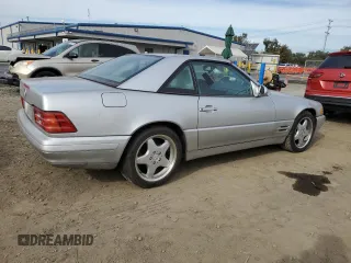 1999 Mercedes-Benz SL-Class with VIN WDBFA68F4XF184335, listed as a Copart auction lot 86287834 with 97,564 mi miles and Salvage Title. Bid and sale history available at carsss.com. Image 3.