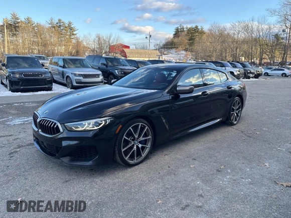 2020 BMW 8 Series M850i with VIN WBAGV8C08LBP48642, listed as a IAAI auction lot 41346377 with 141,651 mi miles. Bid and sale history available at carsss.com. Image 2.
