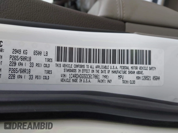 2013 Dodge Durango Crew with VIN 1C4RDHDG5DC617061, listed as a IAAI auction lot 41385801 with 142,304 mi miles. Bid and sale history available at carsss.com. Image 9.