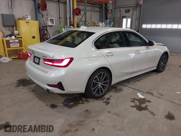 2021 BMW 3 Series 330i xDrive with VIN 3MW5R7J01M8C07735, listed as a IAAI auction lot 41570956 with 70,915 mi miles and . Bid and sale history available at carsss.com. Image 4.
