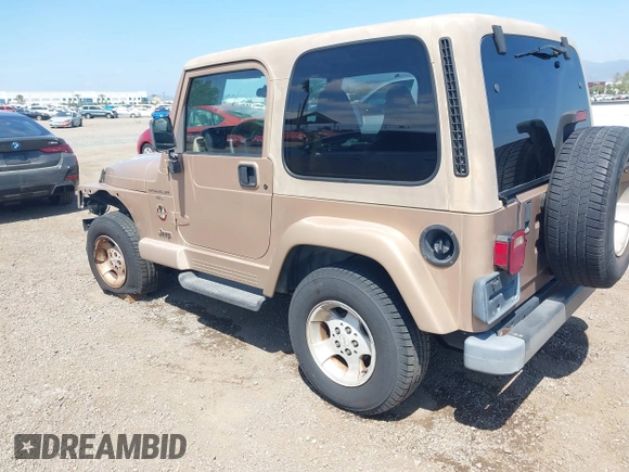 1999 Jeep Wrangler Sahara with VIN 1J4FY49S8XP462512, listed as a IAAI auction lot 42165052 with 146,135 mi miles and . Bid and sale history available at DreamBid. Image 3.