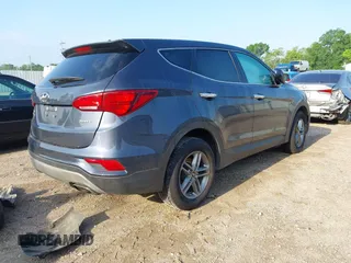 2018 Hyundai Santa Fe 2.4L with VIN 5NMZT3LB2JH092677, listed as a IAAI auction lot 42033763 with 158,039 mi miles and . Bid and sale history available at DreamBid. Image 4.