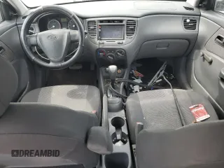 2009 Kia Rio LX with VIN KNADE223996526222, listed as a Copart auction lot 69976484 with 318,702 mi miles and Salvage Title. Bid and sale history available at DreamBid. Image 8.