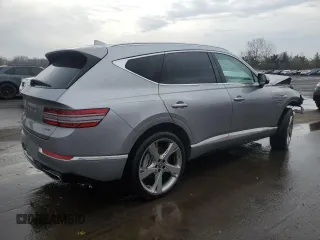 2024 Genesis GV80 z VIN KMUHCESC2RU183192, wystawiony jako Copart lot #52882755 z przebiegiem 14 316 mil mil oraz Szkody całkowita. Historia ofert i sprzedaży dostępna na DreamBid. Obrazek 3.