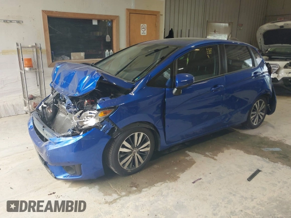 2015 Honda Fit EX-L z VIN 3HGGK5H82FM754220, wystawiony jako IAAI lot #42570240 z przebiegiem Nie podano mil oraz . Historia ofert i sprzedaży dostępna na DreamBid. Obrazek 17.