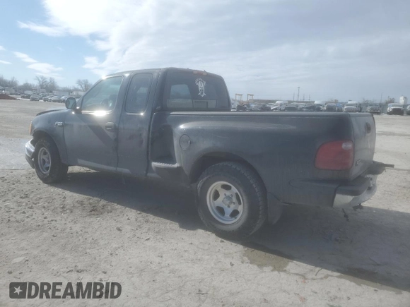 2000 Ford F-150 XL with VIN 1FTZX072XYKA48583, listed as a Copart auction lot 89140115 with Not provided miles and Salvage title. Bid and sale history available at DreamBid. Image 2.