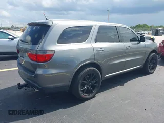 2013 Dodge Durango SXT with VIN 1C4RDHAGXDC500144, listed as a IAAI auction lot 42693122 with 194,519 mi miles and . Bid and sale history available at DreamBid. Image 4.