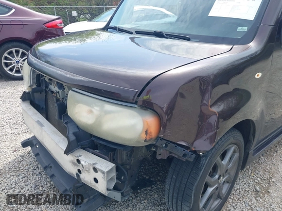 2009 Nissan Cube SL z VIN JN8AZ28R39T111263, wystawiony jako IAAI lot #42050350 z przebiegiem 253 666 mil mil oraz . Historia ofert i sprzedaży dostępna na DreamBid. Obrazek 19.