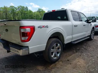 2021 Ford F-150 XL with VIN 1FTFW1E80MFA29126, listed as a IAAI auction lot 42187122 with 79,613 mi miles and . Bid and sale history available at DreamBid. Image 4.