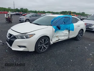 2016 Nissan Maxima SV z VIN 1N4AA6AP2GC375242, wystawiony jako IAAI lot #42220608 z przebiegiem 59 983 mil mil oraz . Historia ofert i sprzedaży dostępna na DreamBid. Obrazek 2.